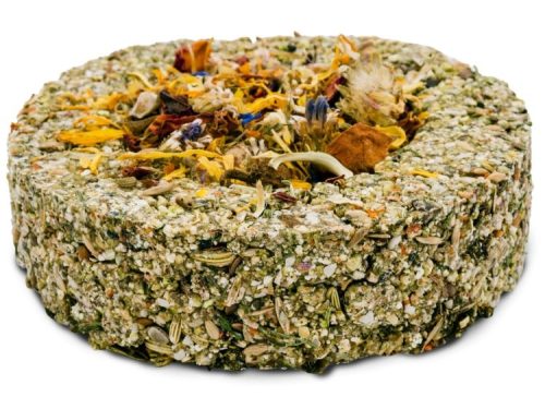 Kostblok til gnavere med naturlige ingredienser og blomsterdekoration, ideel til hamstere og marsvin. Perfekt som sund snack og aktivitetslegetøj.