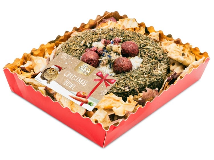 Julestjerne til gnavere fra JR Farm, en festlig godbid med urter og frugt, præsenteret i en rød gaveæske. Ideel til små kæledyr som hamstere og mus.