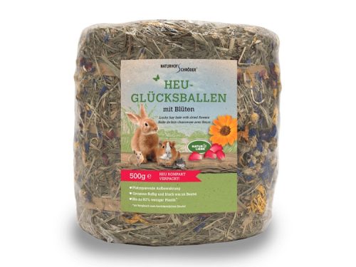 Heu-glücksballe med blomster fra Naturhof Schröder, 500 g. Ideelt foder til gnavere og mindre kæledyr, pakket kompakt for pladsbesparelse og friskhed.