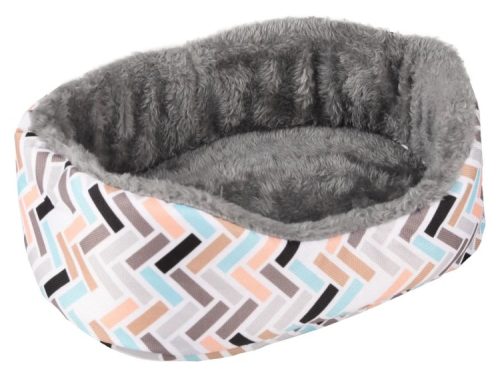 Sød og komfortabel seng til gnavere, med blødt fleece-for og farverigt mønster, ideel til små kæledyr som hamstere og mus. Perfekt til at skabe en tryg og hyggelig soveplads.